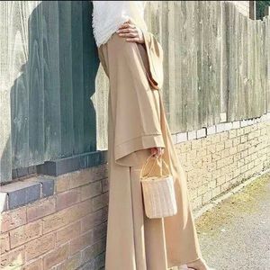 Beige abaya with a zipper on the back